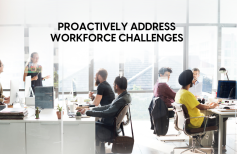 Office with diverse employees working and engaging in a discussion about proactively addressing workforce challenges through effective payroll management.