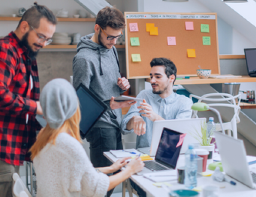 A diverse group of professionals discussing solutions to support the rapid global expansion of small and medium-sized businesses (micro-multinationals). Topics include global payroll challenges, compliance, processing, and outsourcing options.
